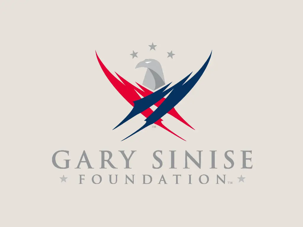 nonprofit charity logo of gary sinise foundation on a tan background